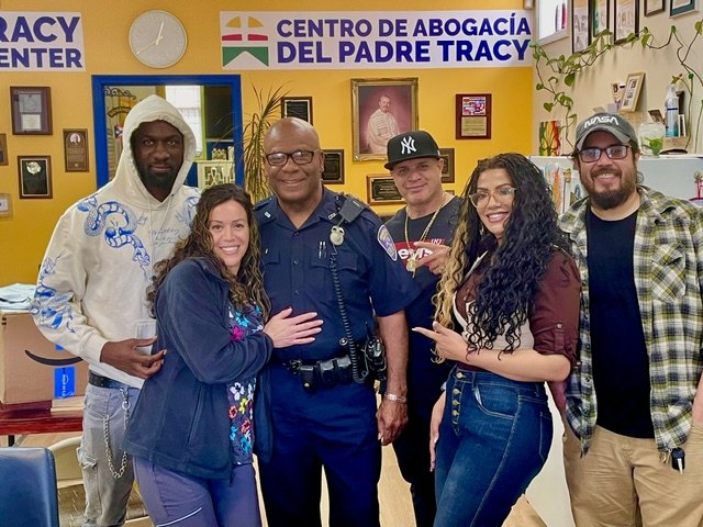 Moses Robinson with community members at Centro de Abogacía del Padre Tracy